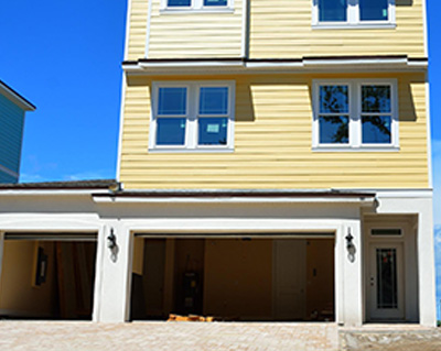 A raised home with a lot of garage space which is necessary in Seaside Park real estate