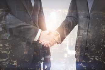 Business partners shaking hands over NJ ITM Maintenance Contracts